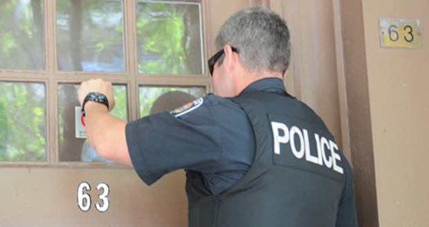 Police knocking on door