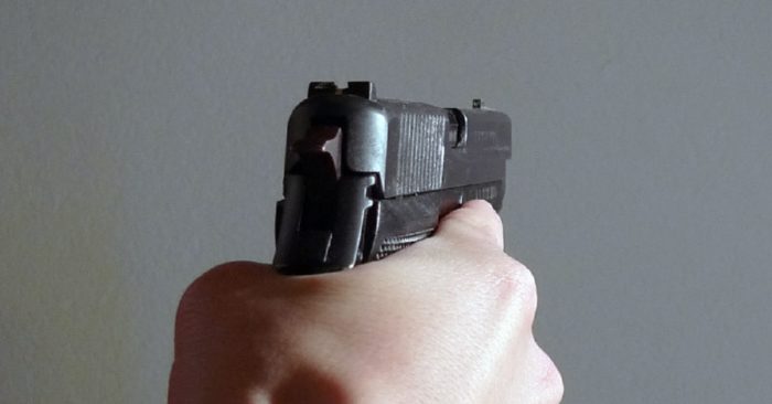 Man holding gun