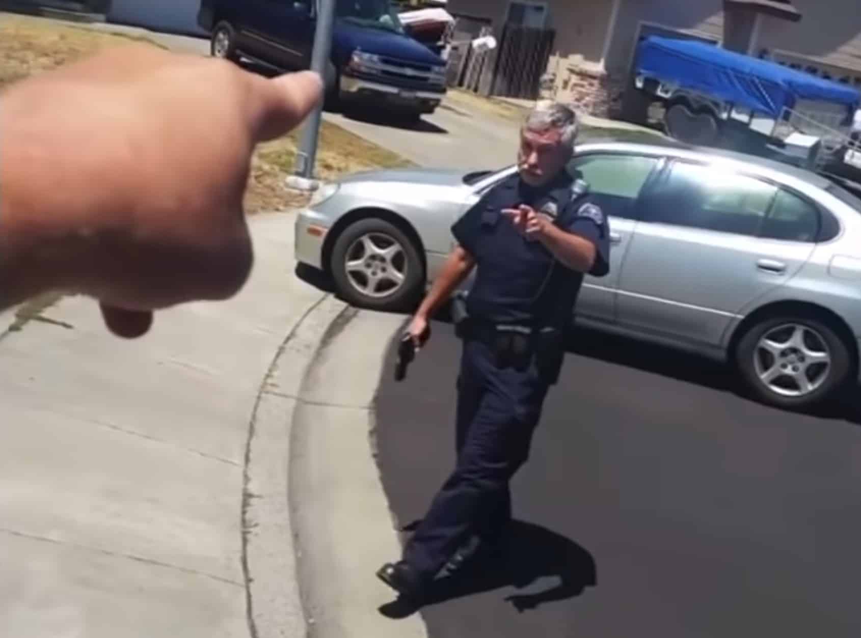 WATCH Cop Draws Gun On Man Who Was Filming Him In Neighborhood Concealed Nation