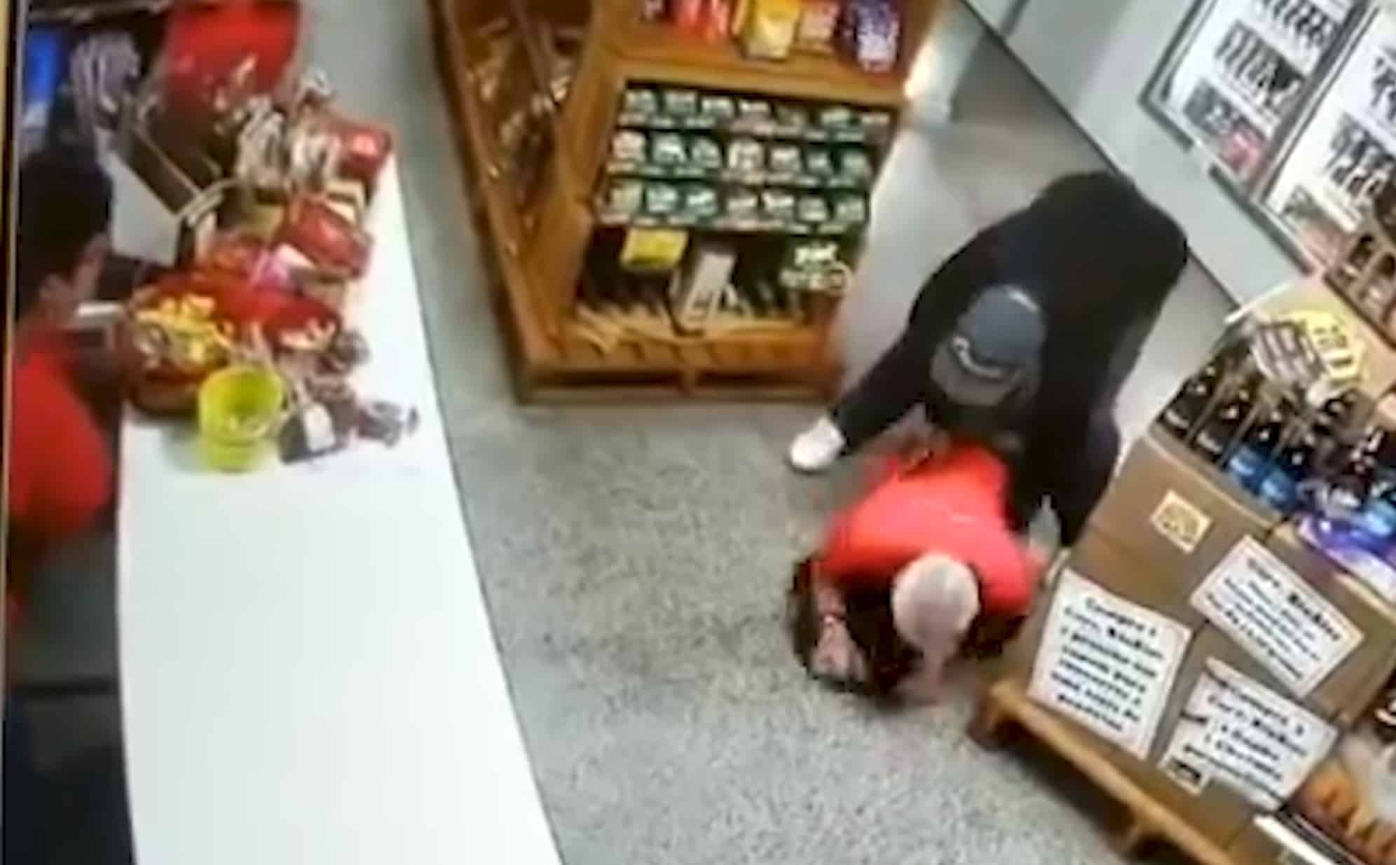 Watch Armed Robber Walks Into Shop Filled With Armed Employees Then Shot In The Back By The