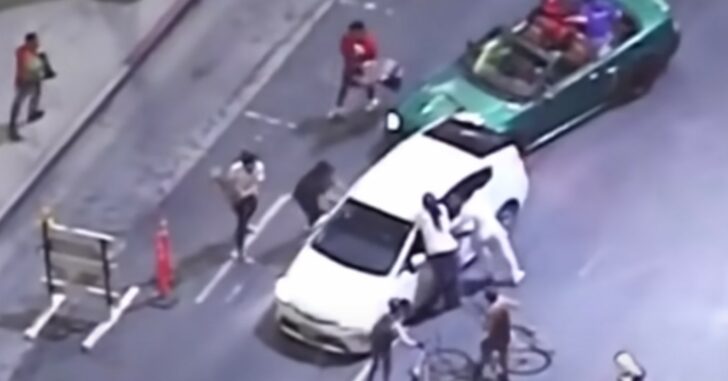 Insane Video Shows Driver Being Chased And Attacked By Rioters